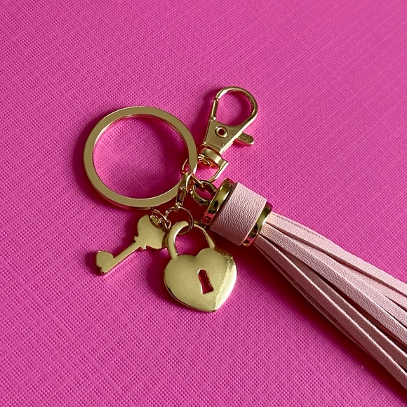 NEW. Bag charm or keychain. Faux leather tassel, removable heart lock charms - Picture 2 of 5
